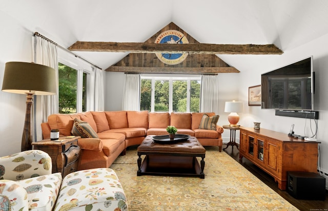 living room with wood finished floors and vaulted ceiling with beams