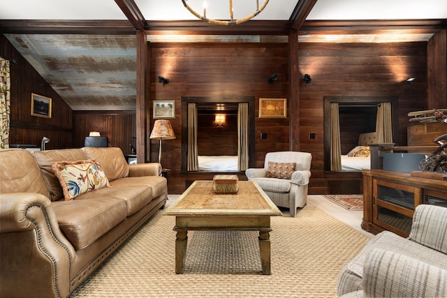 living area with wood walls, lofted ceiling, and wood finished floors