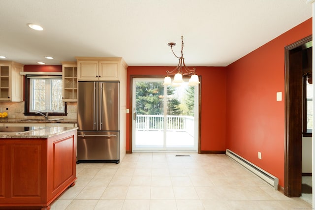 14 Valley View Dr, Wallingford, CT 06492 - kitchen featuring high end fridge, a baseboard heating unit, plenty of natural light, and a sink