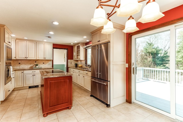 14 Valley View Dr, Wallingford, CT 06492 - kitchen with a center island, a sink, tasteful backsplash, and stainless steel appliances