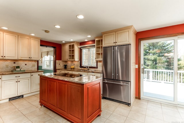 14 Valley View Dr, Wallingford, CT 06492 - kitchen with plenty of natural light, high end refrigerator, decorative backsplash, and stone countertops