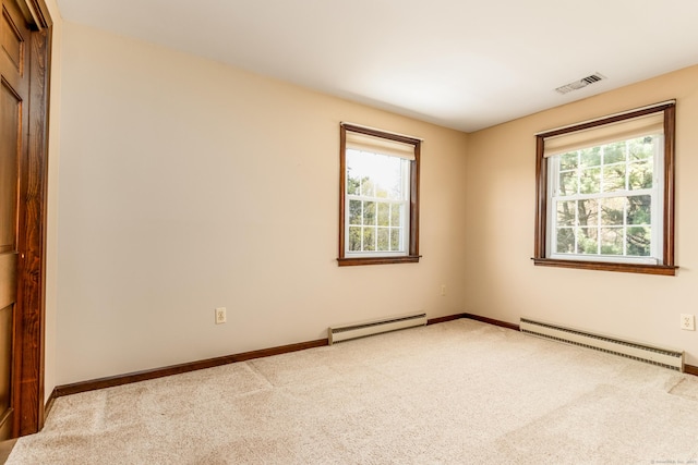 14 Valley View Dr, Wallingford, CT 06492 - carpeted empty room featuring baseboards, baseboard heating, a baseboard heating unit, and visible vents