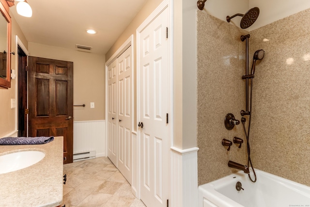 14 Valley View Dr, Wallingford, CT 06492 - full bath featuring visible vents, wainscoting, vanity, a baseboard radiator, and washtub / shower combination