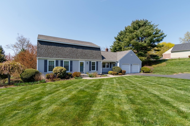 14 Valley View Dr, Wallingford, CT 06492 - colonial inspired home with roof with shingles, driveway, a front yard, and a garage