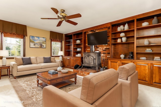 14 Valley View Dr, Wallingford, CT 06492 - living room featuring a wood stove and ceiling fan