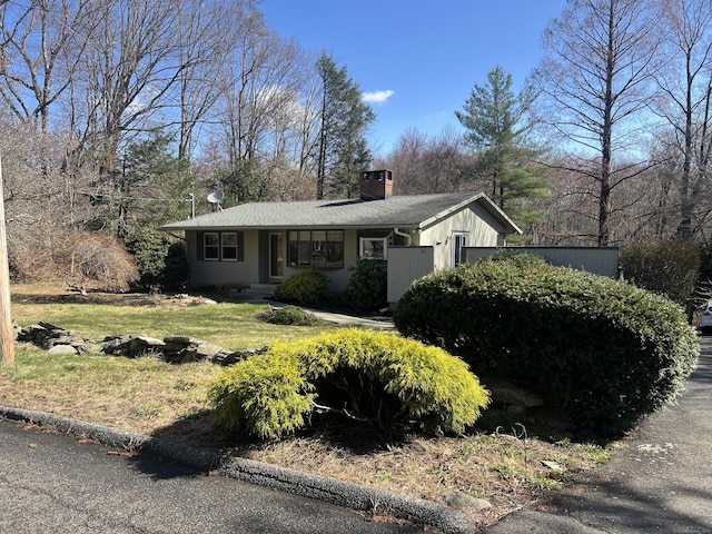 12 Fox Rd, Trumbull, CT 06611 - view of front of house with a chimney and a front yard