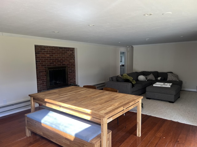 12 Fox Rd, Trumbull, CT 06611 - living room featuring hardwood / wood-style flooring, crown molding, a brick fireplace, a baseboard heating unit, and a baseboard radiator