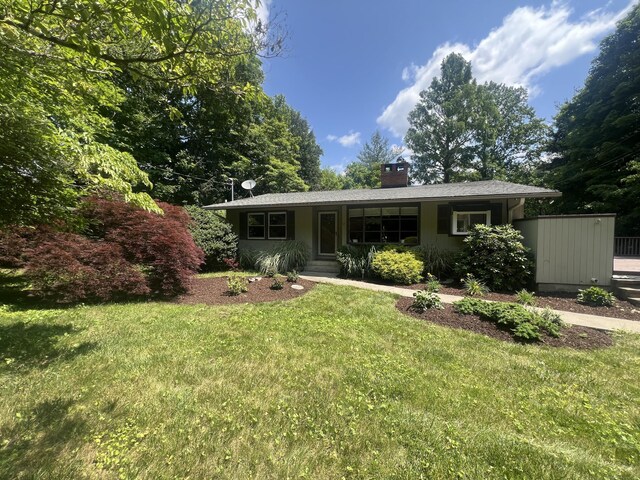 12 Fox Rd, Trumbull, CT 06611 - single story home featuring a front lawn, a chimney, and a porch
