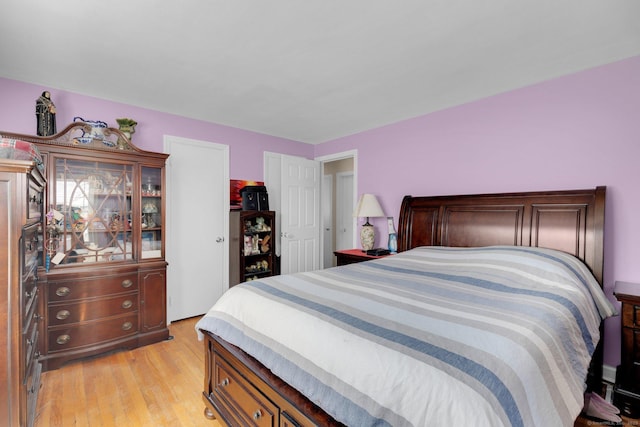bedroom with light wood-style flooring