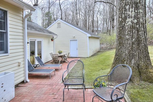 view of patio featuring outdoor dining area