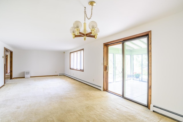 carpeted spare room with a chandelier, baseboards, and a baseboard heating unit