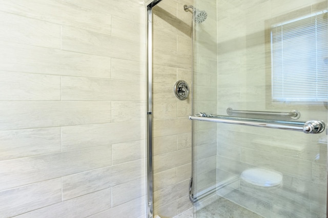 full bathroom featuring a stall shower