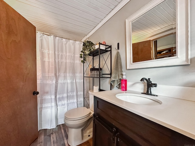 bathroom featuring wood ceiling, curtained shower, wood finished floors, vanity, and toilet
