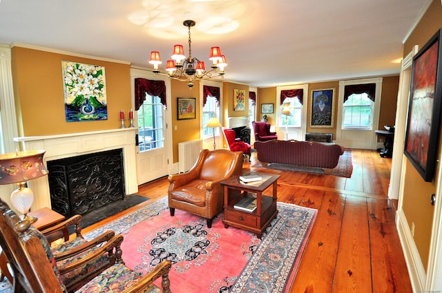 794 Main St, Somers, CT 06071 - living room with a chandelier, hardwood / wood-style flooring, a fireplace with flush hearth, and ornamental molding