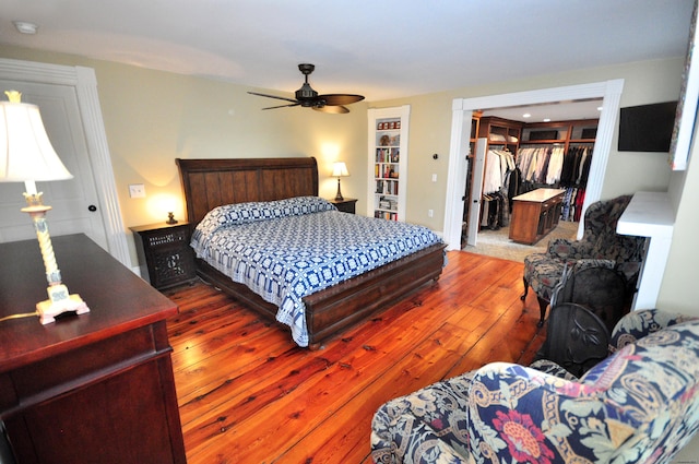794 Main St, Somers, CT 06071 - bedroom featuring wood-type flooring, a walk in closet, a ceiling fan, and a closet