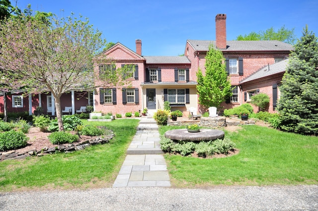794 Main St, Somers, CT 06071 - view of front of house featuring a front lawn and a chimney