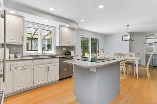 5 Tall Oaks Rd, Wilton, CT 06897 - kitchen featuring stainless steel dishwasher, healthy amount of natural light, light wood-style floors, and recessed lighting