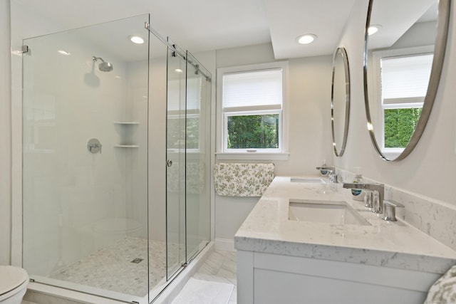 5 Tall Oaks Rd, Wilton, CT 06897 - bathroom with a stall shower, double vanity, recessed lighting, and marble finish flooring