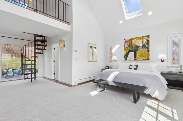 carpeted bedroom featuring a baseboard heating unit, high vaulted ceiling, a skylight, recessed lighting, and baseboards