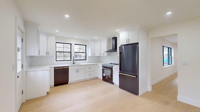 101 Parade Hill Rd, New Canaan, CT 06840 - kitchen with freestanding refrigerator, dishwashing machine, wall chimney range hood, a sink, and electric stove