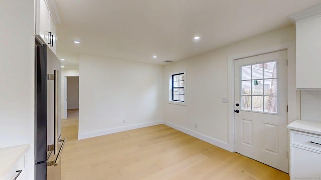 101 Parade Hill Rd, New Canaan, CT 06840 - doorway to outside featuring baseboards, light wood-type flooring, and recessed lighting