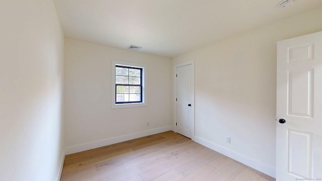 101 Parade Hill Rd, New Canaan, CT 06840 - spare room with visible vents, baseboards, and light wood-type flooring