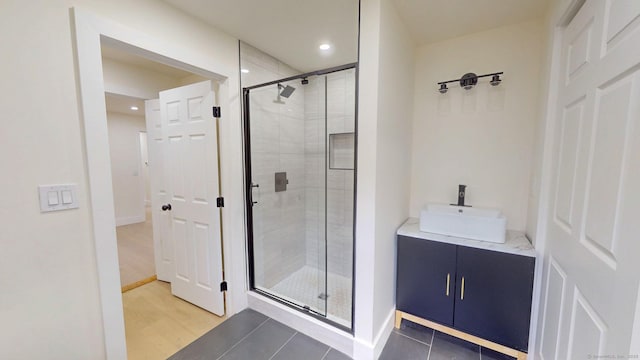 101 Parade Hill Rd, New Canaan, CT 06840 - bathroom with a sink, baseboards, recessed lighting, and a stall shower