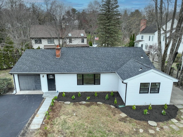101 Parade Hill Rd, New Canaan, CT 06840 - view of front of home featuring aphalt driveway, an attached garage, a chimney, and a shingled roof