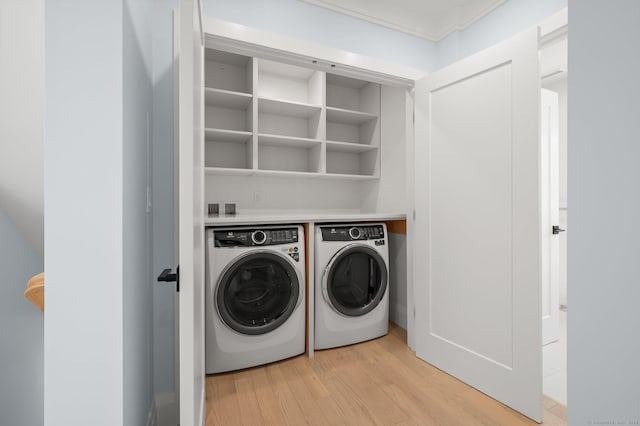 56-58 E Main St, Stonington, CT 06355 - washroom with light wood-style flooring, washer and dryer, and laundry area