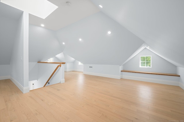 56-58 E Main St, Stonington, CT 06355 - additional living space featuring baseboards, recessed lighting, light wood-style floors, visible vents, and lofted ceiling with skylight