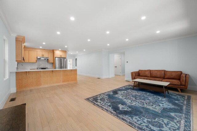 56-58 E Main St, Stonington, CT 06355 - living room with light wood-style floors, recessed lighting, visible vents, and ornamental molding