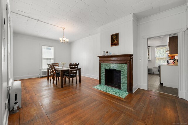 56-58 E Main St, Stonington, CT 06355 - dining space featuring a wealth of natural light, radiator, crown molding, and a chandelier