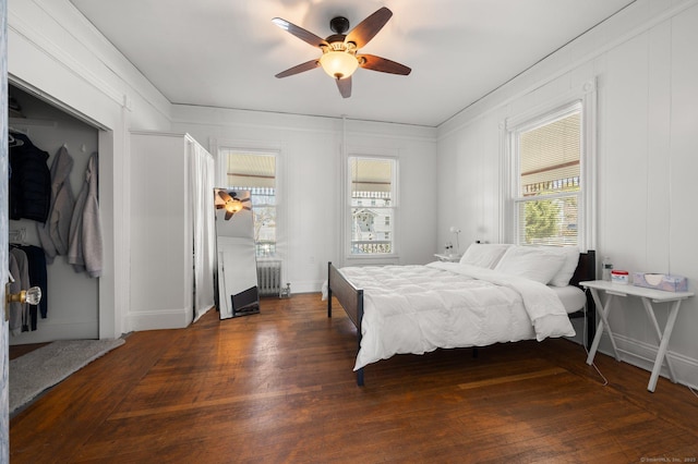 56-58 E Main St, Stonington, CT 06355 - bedroom featuring radiator, wood finished floors, and a ceiling fan
