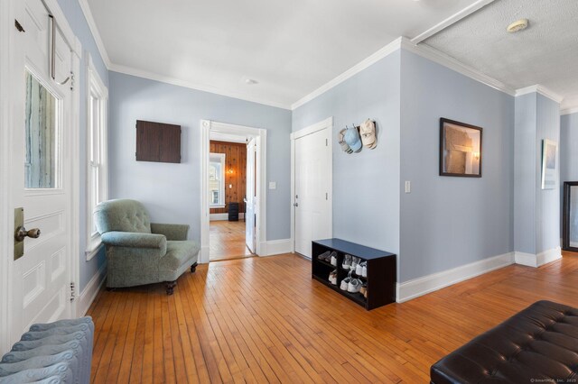 56-58 E Main St, Stonington, CT 06355 - interior space with light wood-style flooring, baseboards, and crown molding