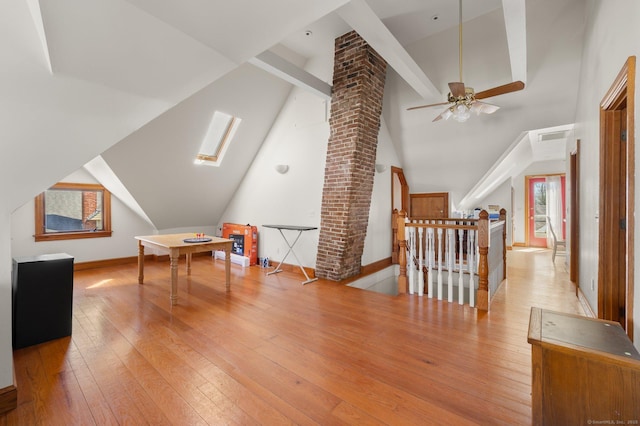56-58 E Main St, Stonington, CT 06355 - bonus room featuring vaulted ceiling with skylight, baseboards, hardwood / wood-style floors, and a ceiling fan