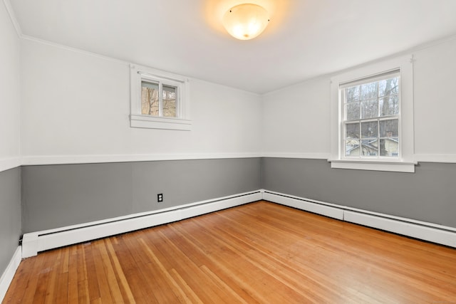 unfurnished room with light wood-type flooring