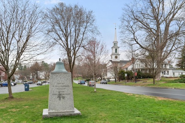 view of community with a lawn