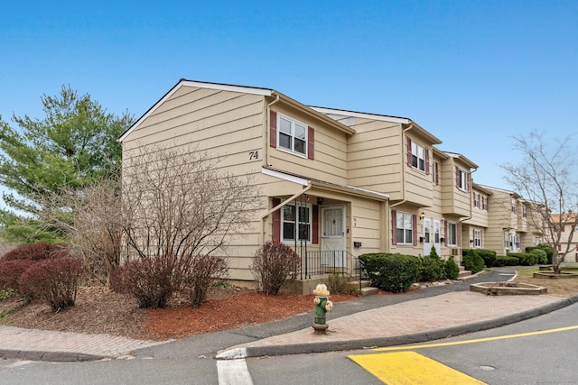view of front of property with a residential view