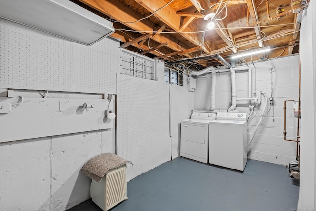 washroom with washer and dryer and laundry area