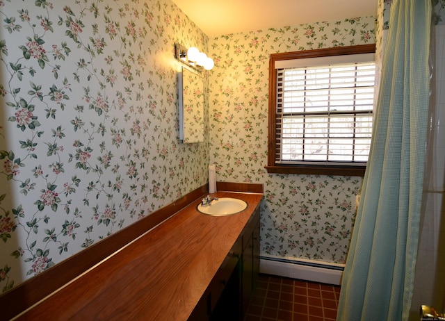 bathroom with wallpapered walls, curtained shower, baseboards, baseboard heating, and vanity
