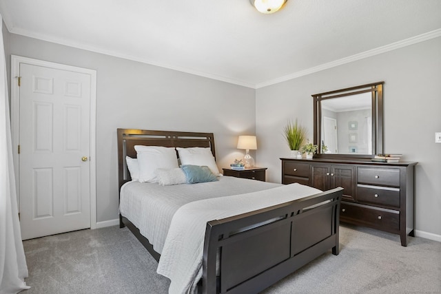 bedroom featuring light carpet, baseboards, and ornamental molding