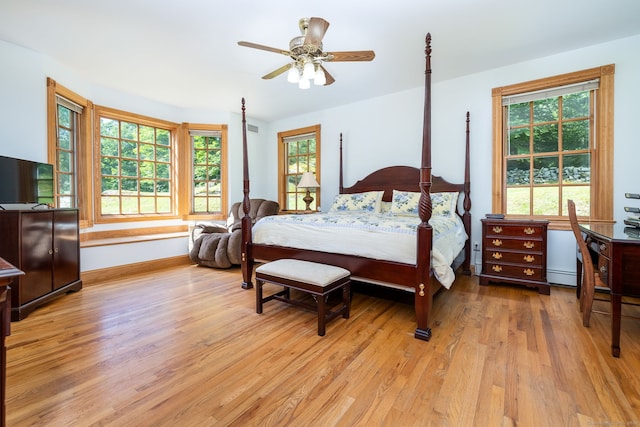 40 Old Bridge Rd, Brookfield, CT 06804 - bedroom featuring baseboard heating, light wood-type flooring, baseboards, and a ceiling fan