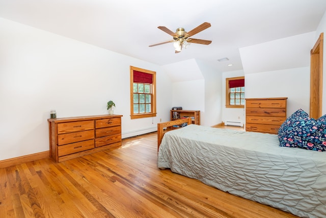 40 Old Bridge Rd, Brookfield, CT 06804 - bedroom with baseboards, multiple windows, wood finished floors, and baseboard heating