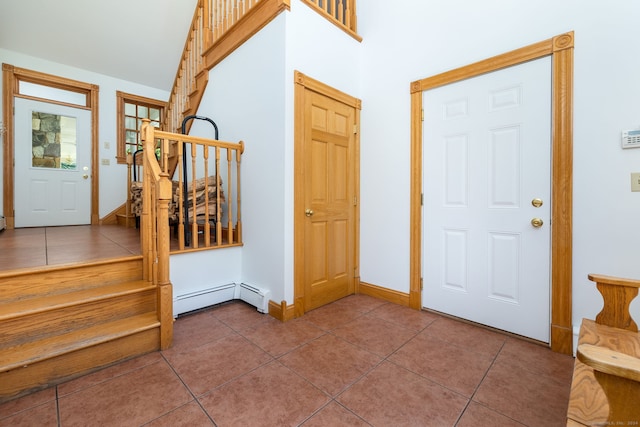 40 Old Bridge Rd, Brookfield, CT 06804 - tiled foyer entrance featuring high vaulted ceiling, stairs, baseboard heating, and baseboards