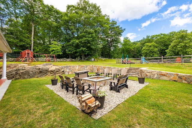 40 Old Bridge Rd, Brookfield, CT 06804 - view of yard with an outdoor fire pit, fence, and a playground