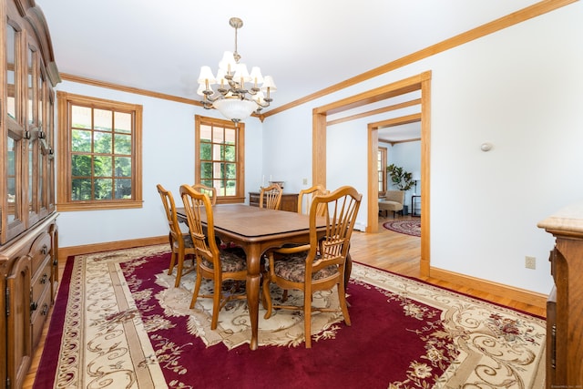 40 Old Bridge Rd, Brookfield, CT 06804 - dining space with a chandelier, healthy amount of natural light, light wood-style floors, and crown molding