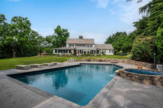 77 Eastfield Rd, Waterbury, CT 06708 - view of swimming pool featuring a yard, a pool with connected hot tub, and a patio area