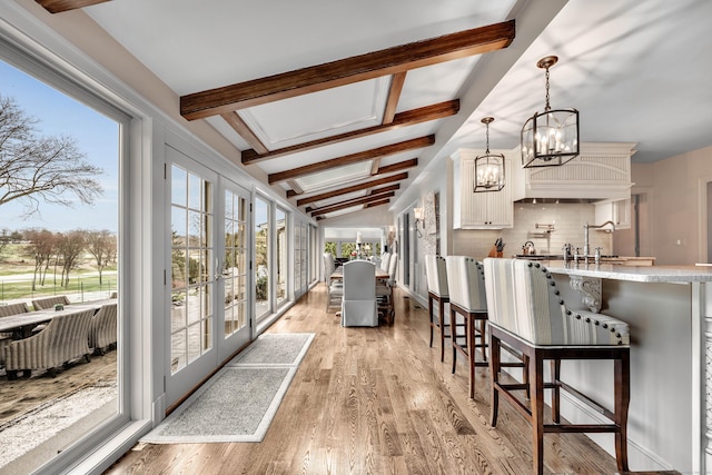 77 Eastfield Rd, Waterbury, CT 06708 - sunroom / solarium featuring an inviting chandelier, french doors, beamed ceiling, and a sink