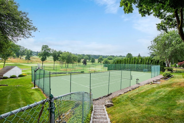 77 Eastfield Rd, Waterbury, CT 06708 - view of sport court with a lawn and fence