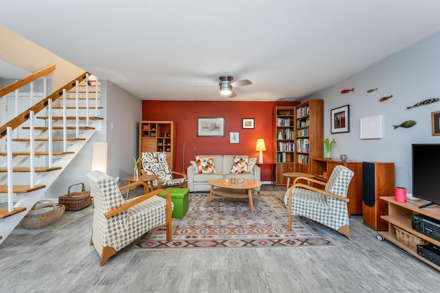 199 Gregory Blvd Apt F1, Norwalk, CT 06855 - living area featuring wood finished floors, stairs, and ceiling fan